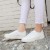 حذاء مسطح بلون أبيض