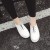 حذاء كاجوال مسطح بلون أبيض